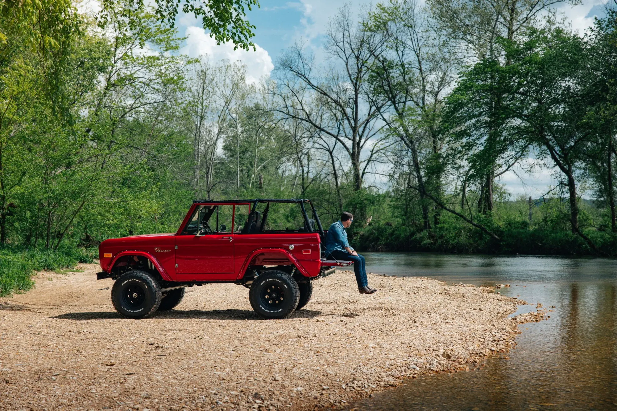 Red first-gen on the river bank. Photography: Britton Hardcastle.