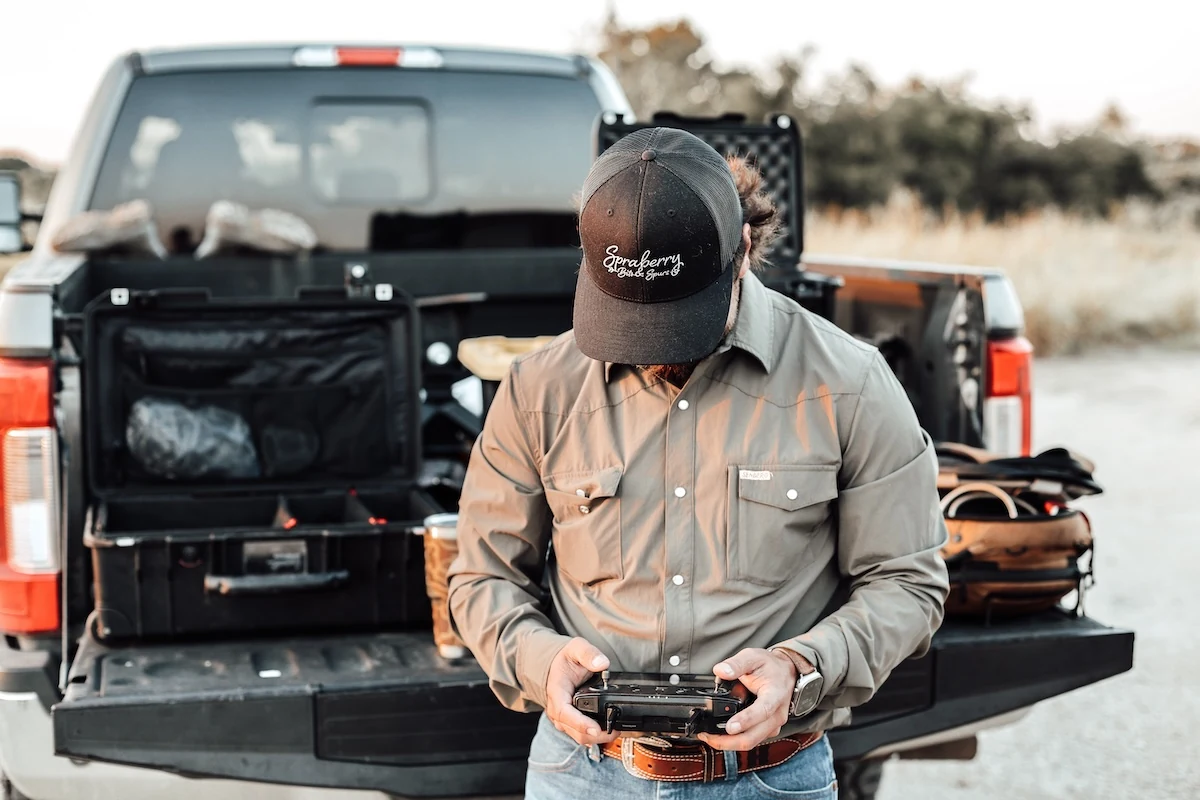 Flying drone coverage from the tailgate on a shoot day